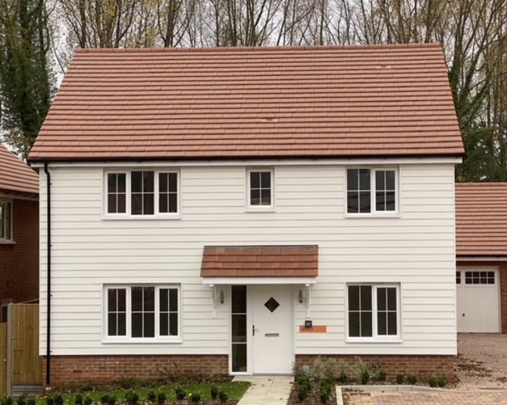 White composite cladding installed on the exterior of a house in Gosport.