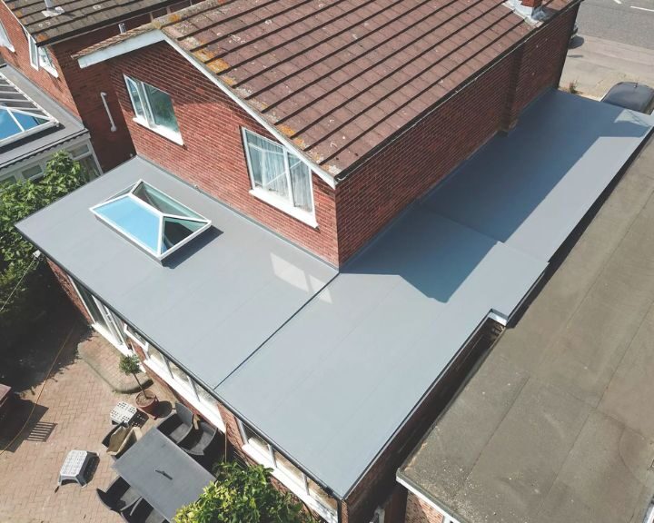 New GRP flat roof featuring a new skylight installed on residential property extension.